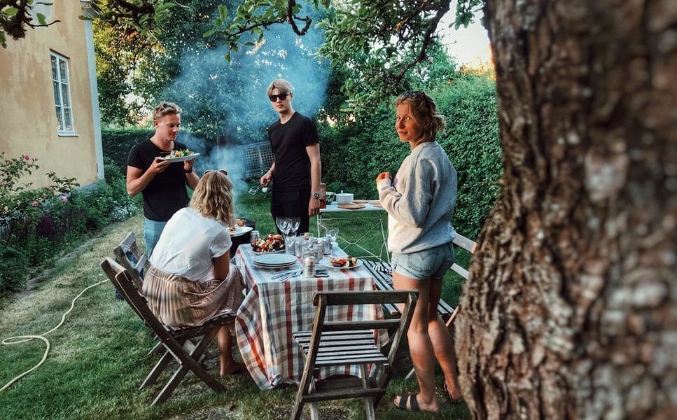 Group of friends at barbecue party outdoors