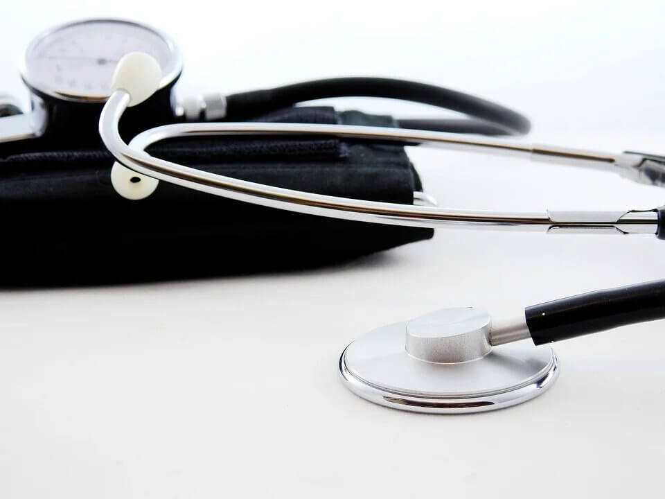 A stethoscope on a white surface