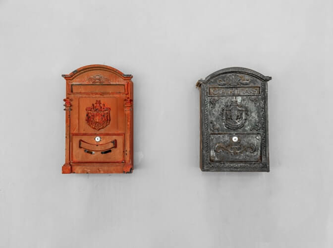 Two vintage mailboxes