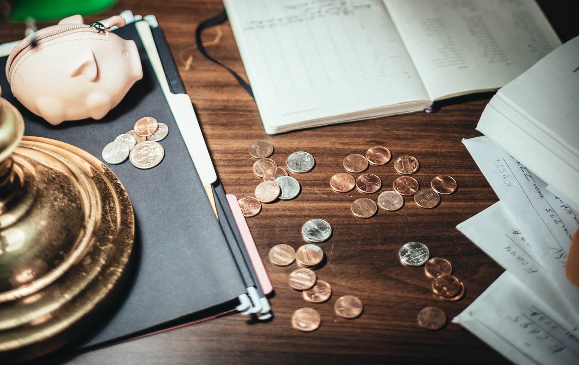 Coins scattered on a desk