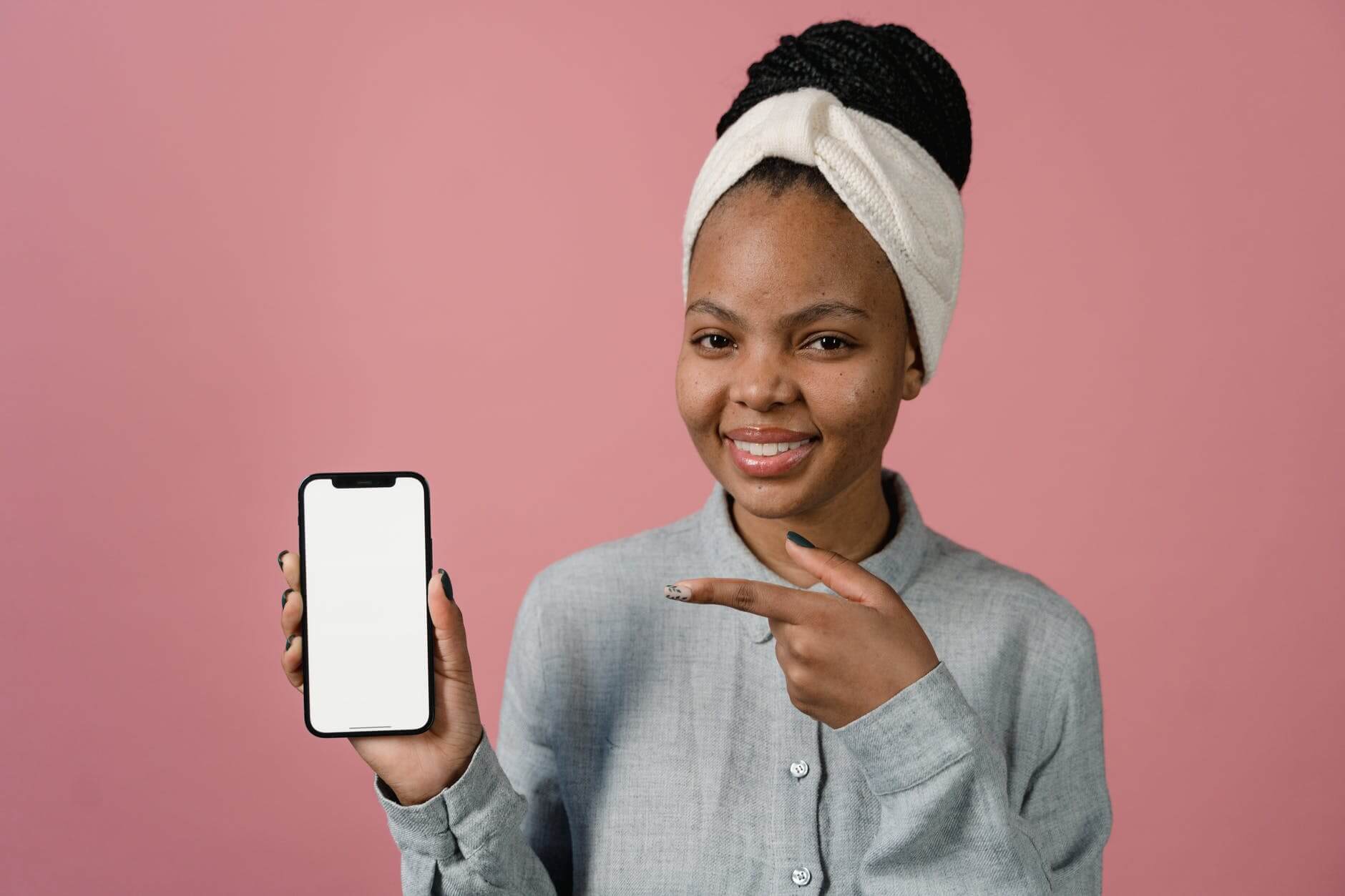 A woman holding a phone