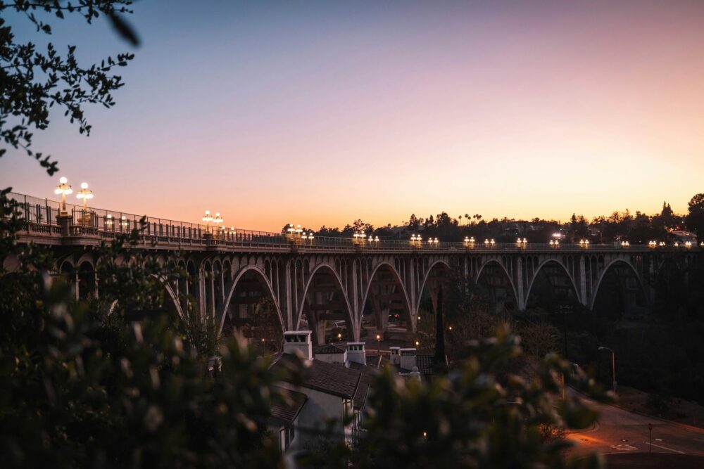 Light rail train crossing the iconic Colorado Street Bridge into Pasadena, California.