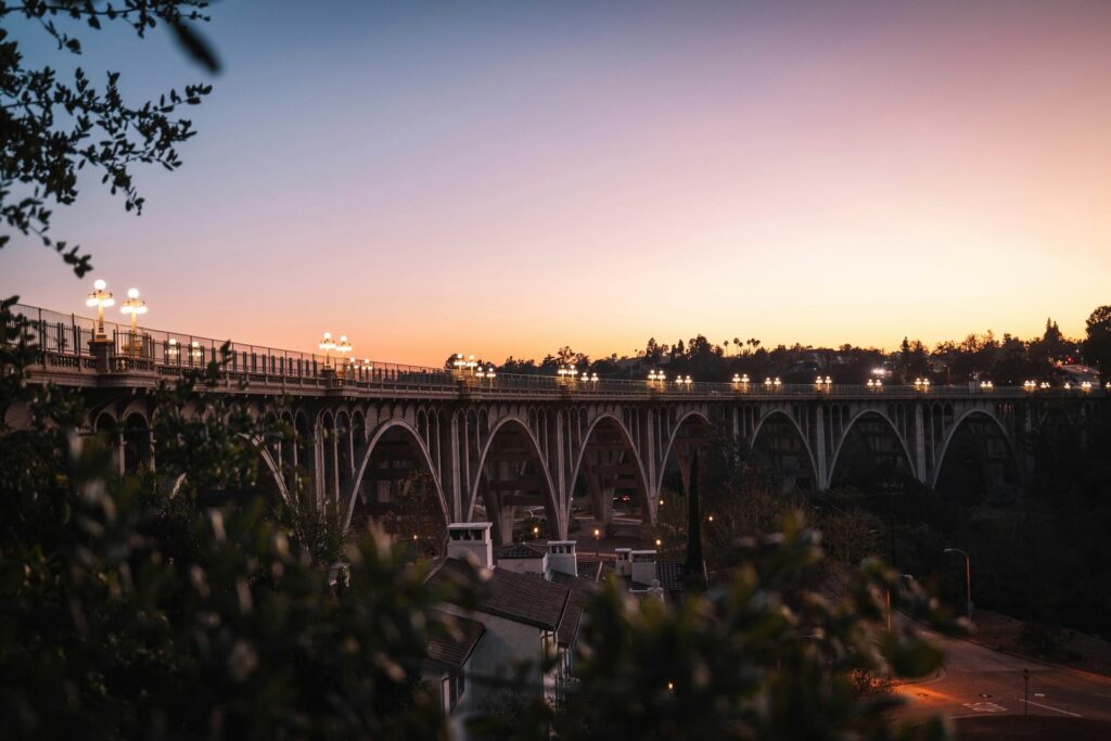 Light rail train crossing the iconic Colorado Street Bridge into Pasadena, California.